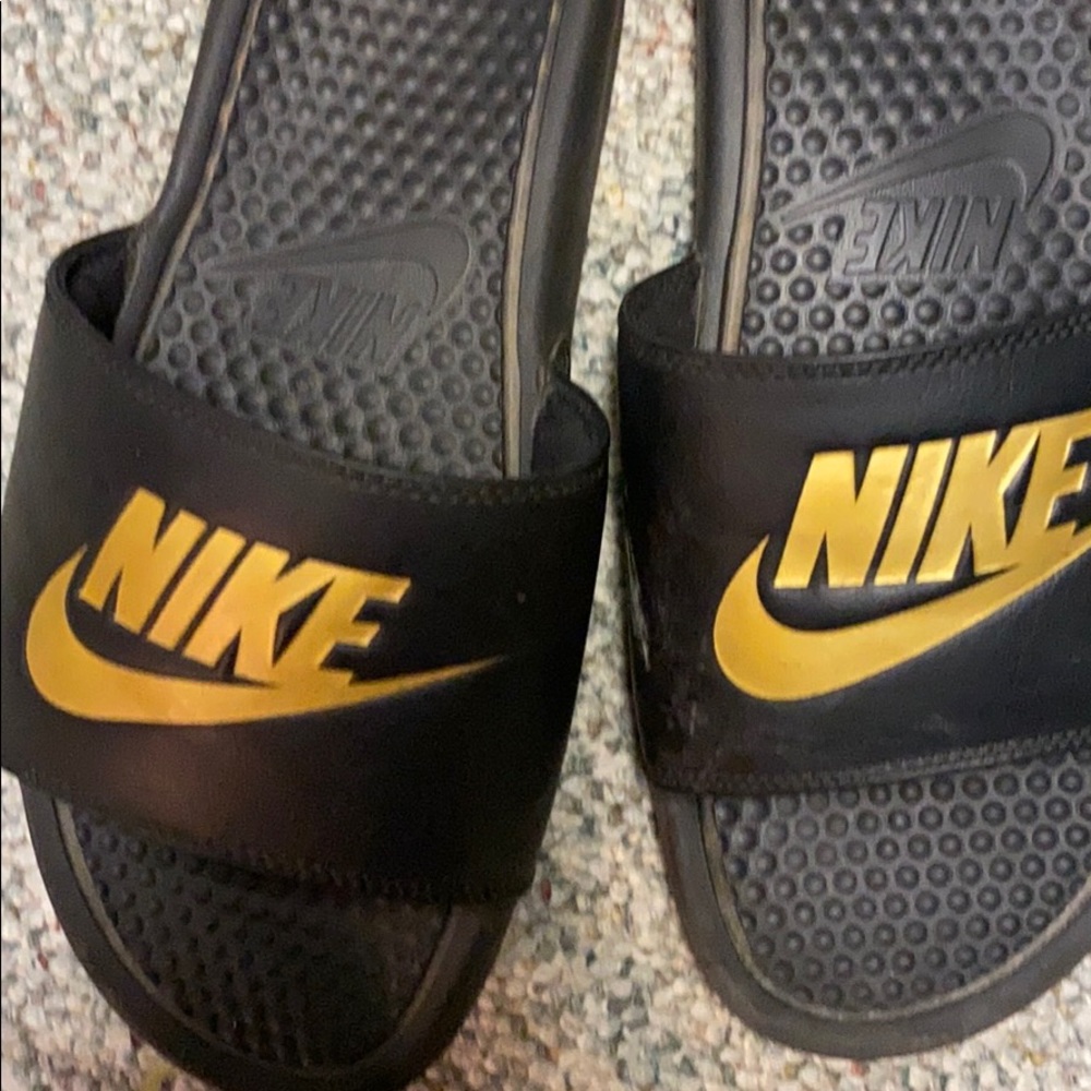 Gold nike slides